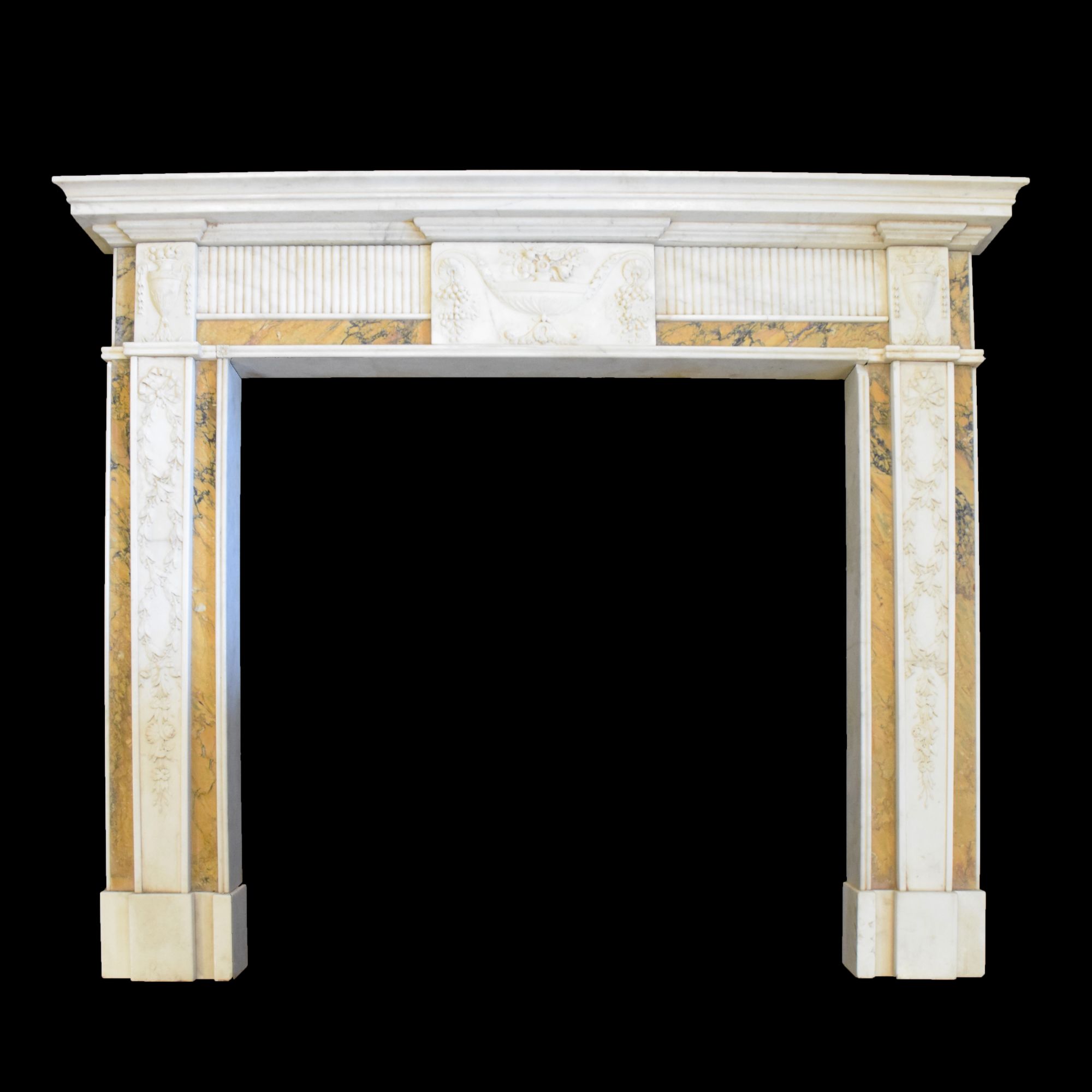 Fine neoclassical style statuary marble chimneypiece or fireplace surround, probably George III period, circa 1790. Sold for £7,200