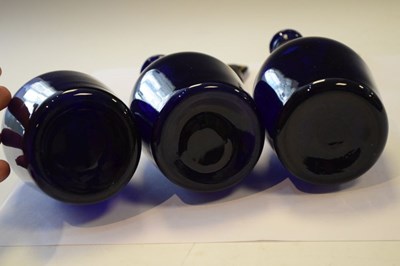 Lot 481 - Three blue decanter bottles