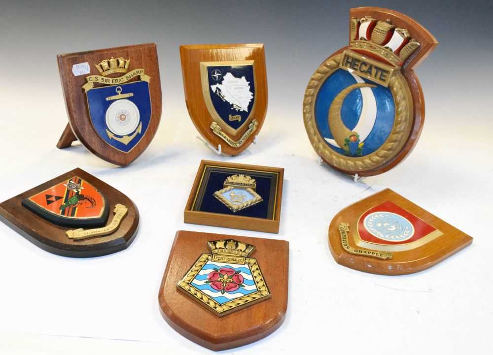 Lot 299 - Seven mounted regimental crests