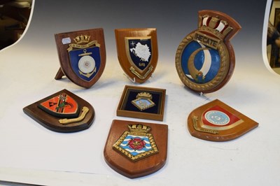 Lot 299 - Seven mounted regimental crests