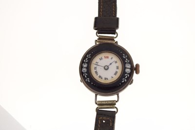 Lot 123 - Lady's silver-cased wristwatch with enamel bezel