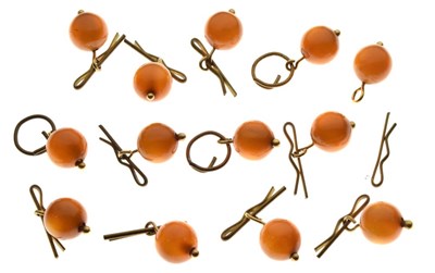 Lot 82 - Collection of thirteen amber bead buttons