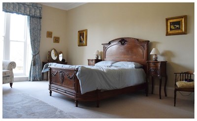 Lot 545 - 19th Century French walnut King size bed