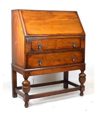 Lot 586 - 1920s oak fall front bureau