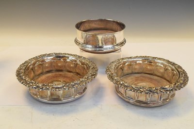 Lot 176 - Elizabeth II silver bottle coaster together with a pair of plated wine coasters