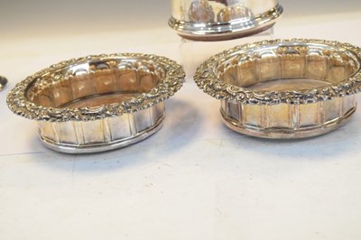 Lot 176 - Elizabeth II silver bottle coaster together with a pair of plated wine coasters