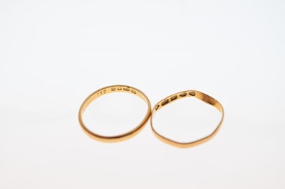 Lot 23 - Two 22ct gold wedding bands