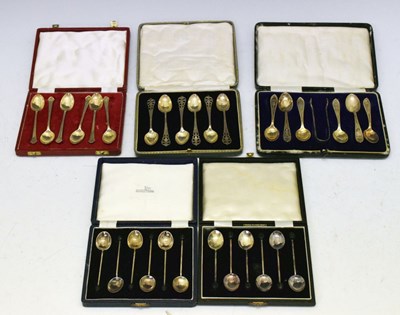Lot 192 - Four cased silver teaspoons sets together with a set of enamel and silver-plated coffee spoons