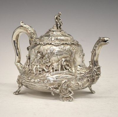 Lot Early Victorian silver teapot decorated with tavern scenes in the manner of David Teniers
