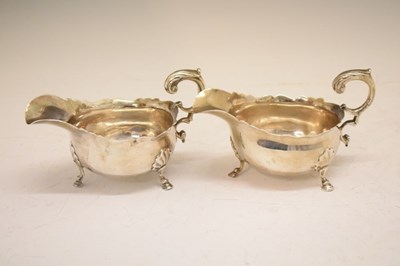 Lot 72 - Pair of George II silver sauceboats