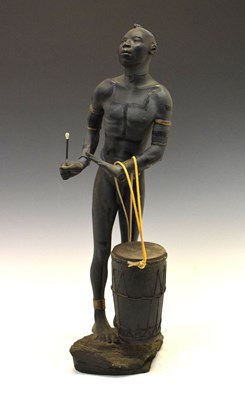 Lot 275 - Resin figure of an African drummer