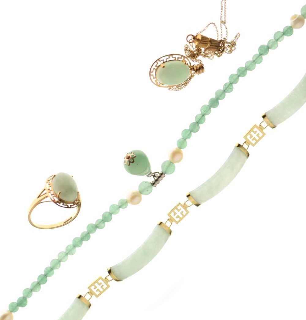 Lot 95 - 9ct gold jade panel bracelet, a 9ct gold jade pendant and matching ring, and a bead necklace (4)