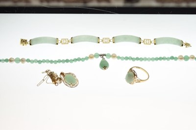 Lot 95 - 9ct gold jade panel bracelet, a 9ct gold jade pendant and matching ring, and a bead necklace (4)
