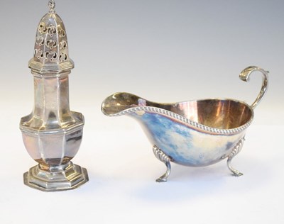 Lot 175 - Edward VII silver hexagonal baluster sugar caster together with a George V silver sauce boat
