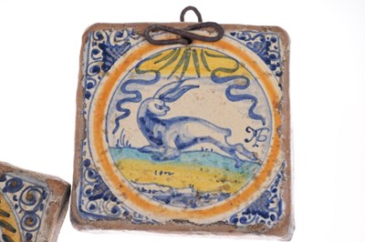 Lot 321 - Three 17th Century Dutch Delft tiles, together with a Spanish tile
