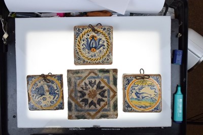 Lot 321 - Three 17th Century Dutch Delft tiles, together with a Spanish tile