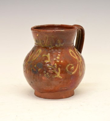 Lot 344 - 19th Century slipware pottery mug