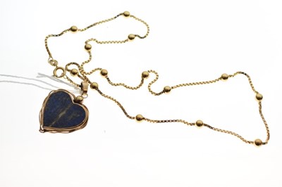 Lot 89 - Lapis lazuli heart-shaped pendant with 9ct gold chain