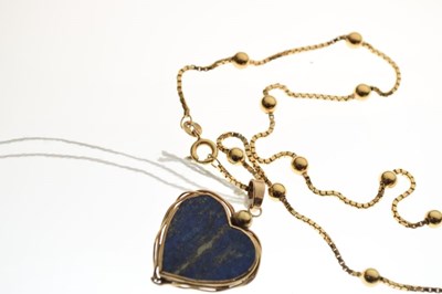 Lot 89 - Lapis lazuli heart-shaped pendant with 9ct gold chain