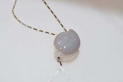 Lot 86 - Chinese carved hardstone (possibly jade) peach pendant with fine chain