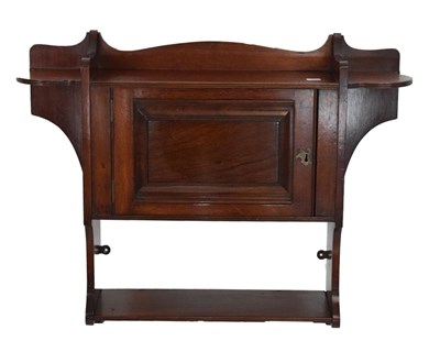 Lot 556 - Edwardian mahogany hanging cupboard