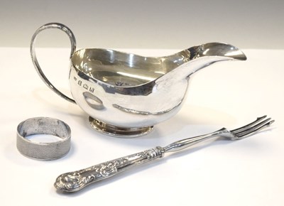 Lot 180 - Elizabeth II silver sauce boat, together with a napkin ring and silver-handled pickle fork