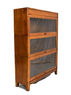 Lot 441 - Oak 'Globe Wernicke' style three-section bookcase