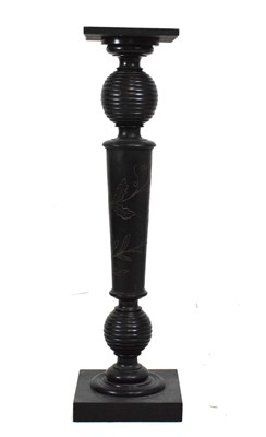 Lot 632 - Ebonised torchere