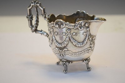 Lot 146 - Silver cream jug with classical decoration