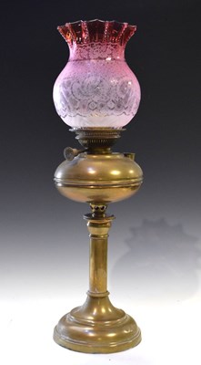 Lot 618 - Oil lamp having cranberry shade