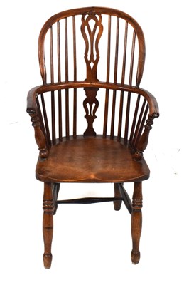 Lot 440 - 19th Century yew, ash and elm low hoop back Windsor armchair