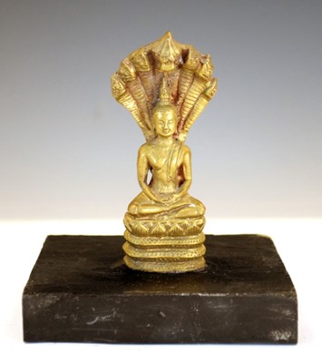 Lot 266 - South East Asian bronze Buddha with cobra