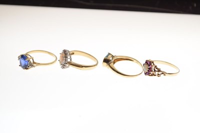 Lot 33 - Four various gem set rings