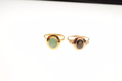 Lot 28 - Jade ring and another cabochon ring
