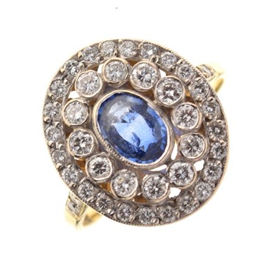 Lot 24 - Sapphire and diamond cluster ring