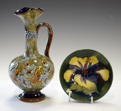 Lot 349 - Doulton Lambeth ewer, together with a Moorcroft Hibiscus pattern pin dish