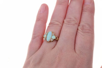 Lot 38 - Three stone opal ring