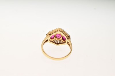 Lot 26 - Ruby and diamond ballerina cluster ring