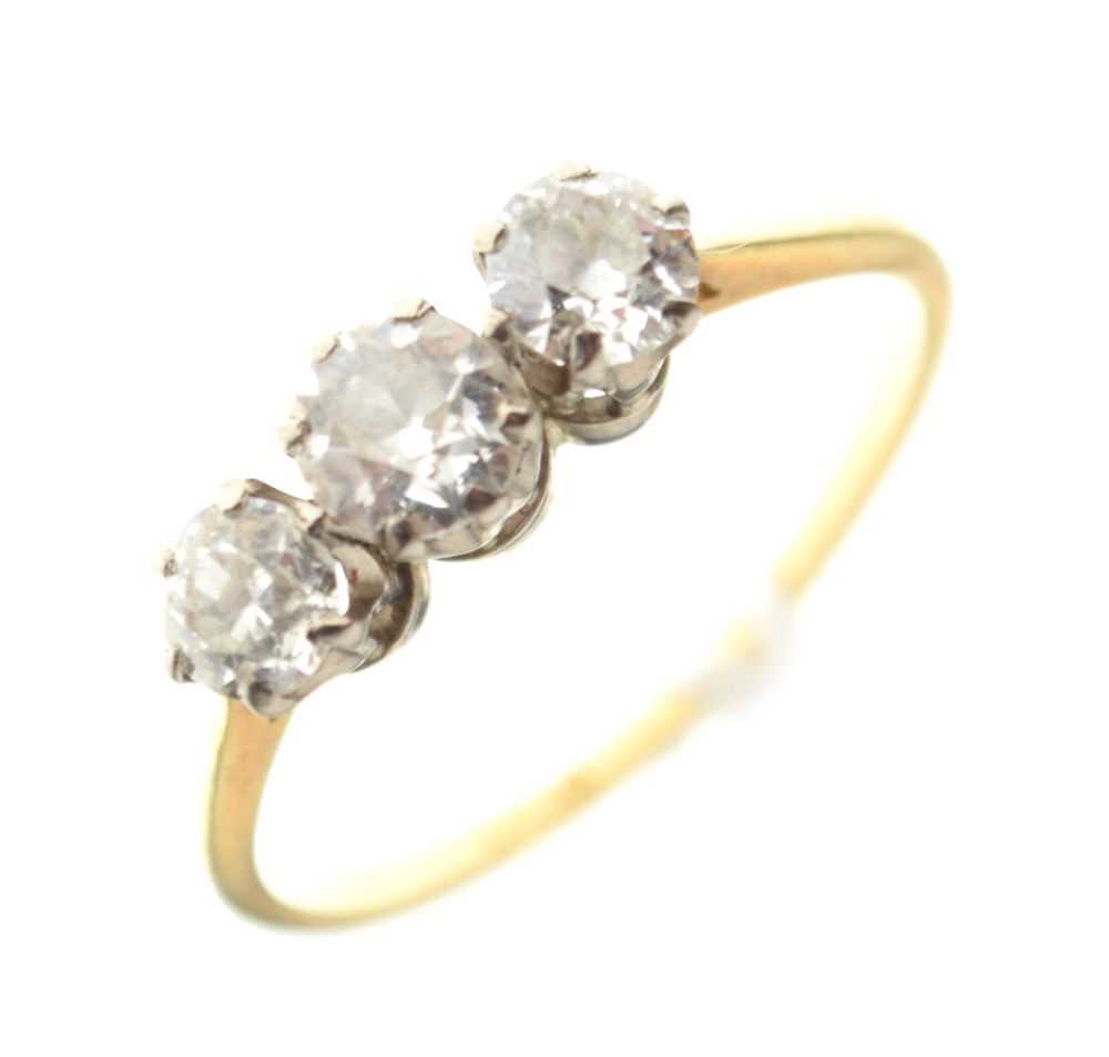 Lot 6 - Yellow metal (18ct) three-stone diamond ring, 2.3g gross approx