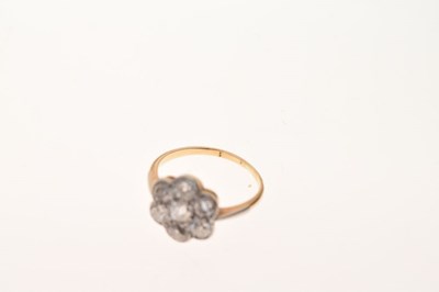 Lot 11 - Seven stone diamond cluster ring