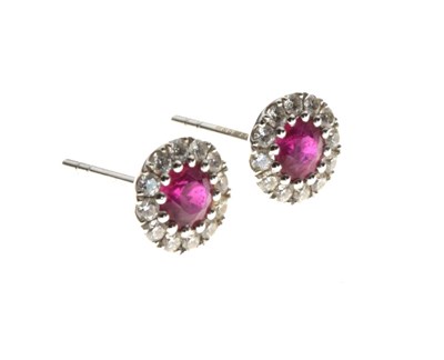 Lot 25 - Pair of ruby and diamond cluster earstuds