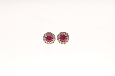 Lot 71 - Pair of ruby and diamond cluster ear studs