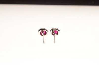 Lot 71 - Pair of ruby and diamond cluster ear studs