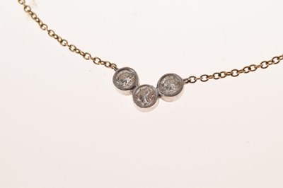 Lot 47 - Three stone diamond necklace