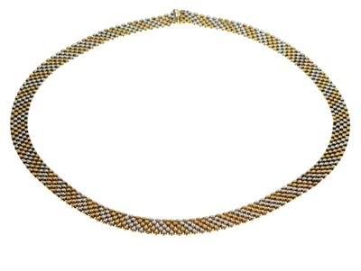 Lot 33 - 9ct gold yellow and white two-colour flexible necklace