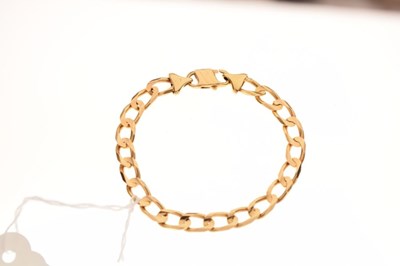 Lot 40 - Yellow metal filed curb-link bracelet, stamped '750'