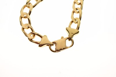 Lot 40 - Yellow metal filed curb-link bracelet, stamped '750'