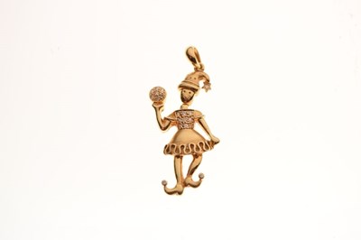 Lot 69 - Diamond set yellow metal articulated clown pendant