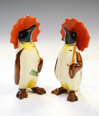 Lot 283 - Pair of Beswick penguins with red parasols