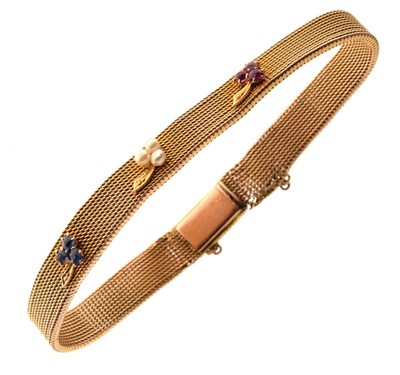 Lot 37 - Yellow metal (14K/585) gem-set flexible bracelet